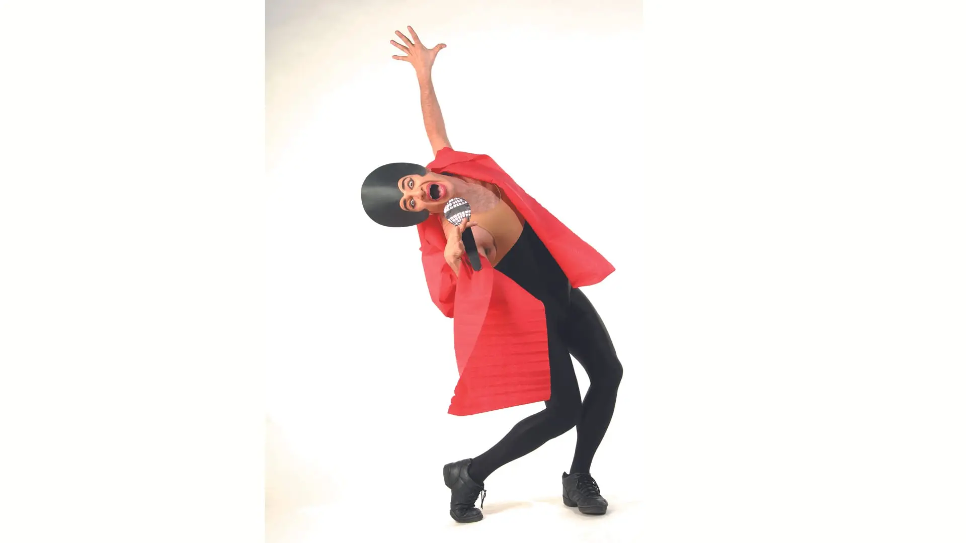 Ennio in a red paper costume, mid-song