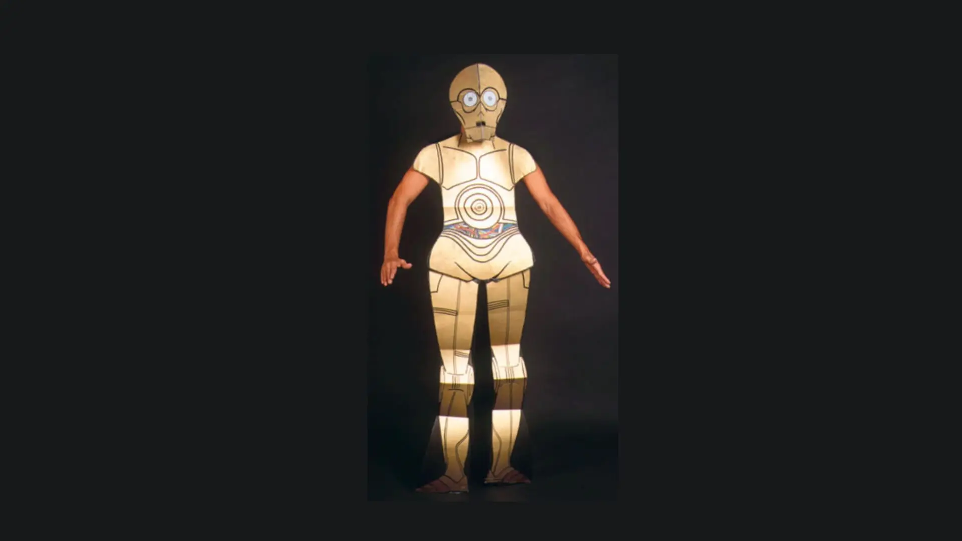 Ennio as a gold paper robot