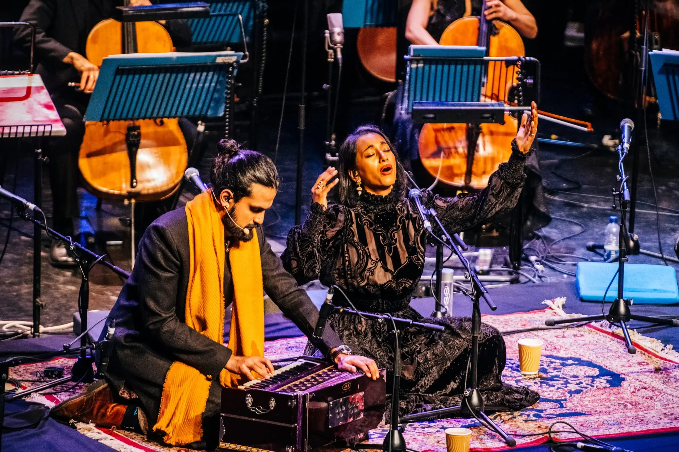 Abi Sampa singing and Rushil Ranjan at the harmonium, cellos behind